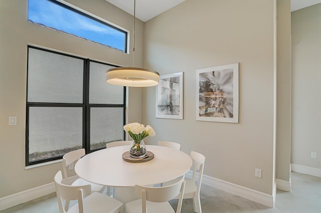 dining space with baseboards