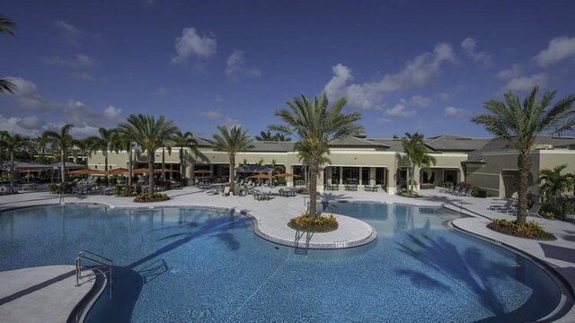 pool featuring a patio area