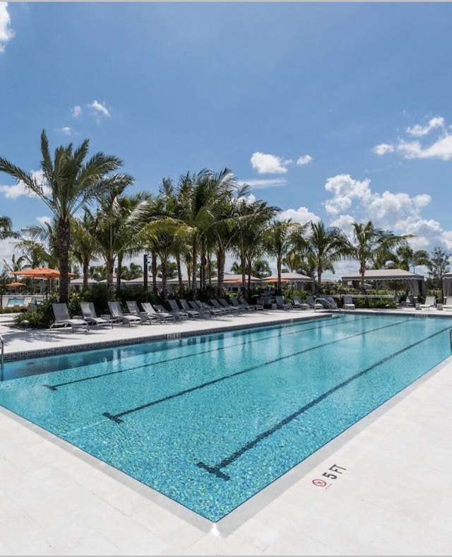 pool with a patio area