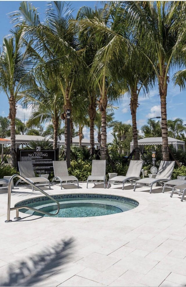 view of swimming pool featuring a pool and a patio area