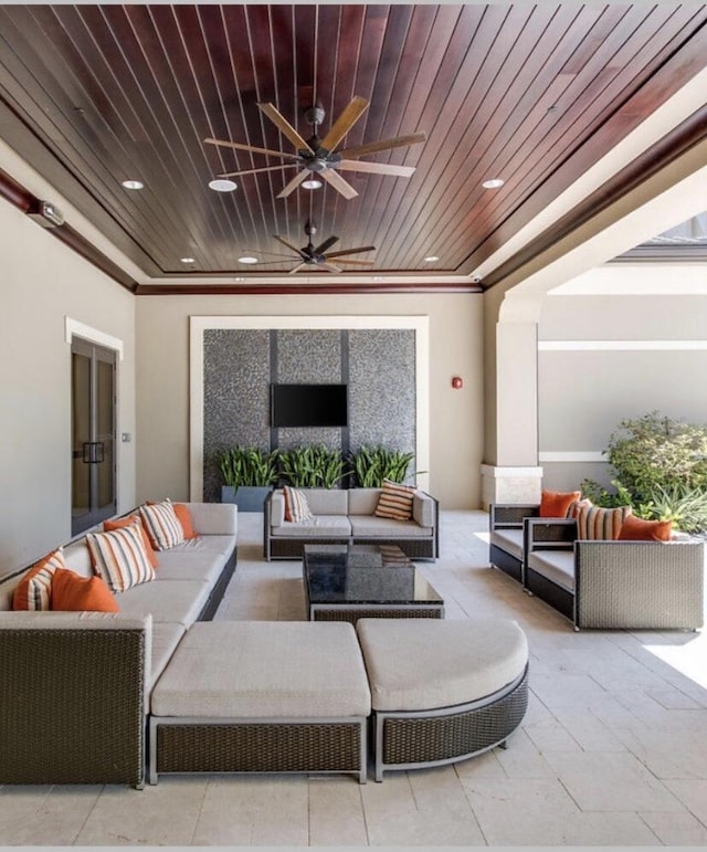 view of patio / terrace with a ceiling fan and outdoor lounge area