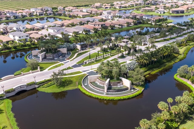 aerial view featuring a water view and a residential view