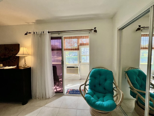 living area featuring tile patterned floors
