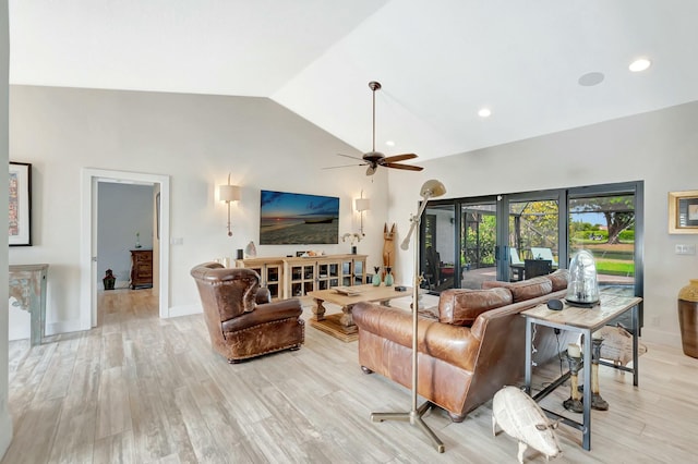 living room with light wood-style floors, french doors, baseboards, and a ceiling fan