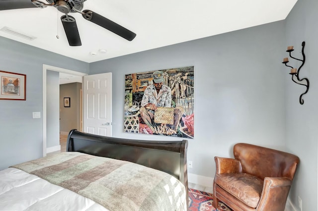 bedroom with visible vents, ceiling fan, and baseboards