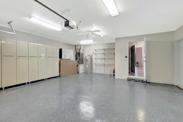 garage with heating unit, water heater, and a garage door opener