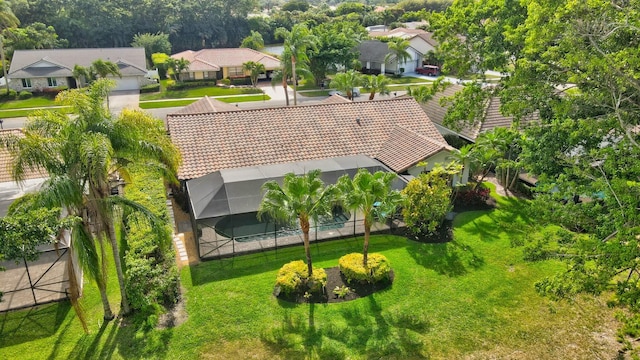 birds eye view of property with a residential view