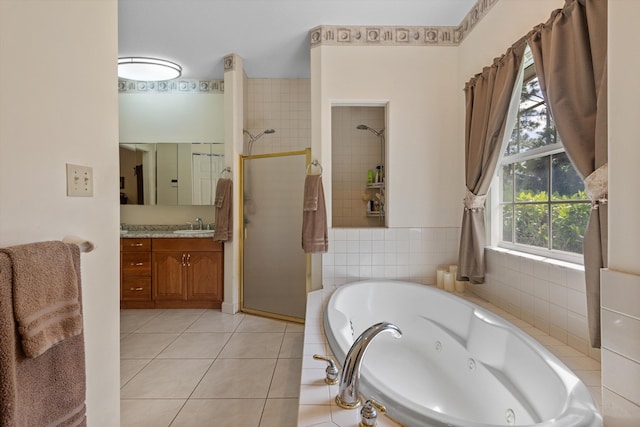 2891 SE Tailwinds Rd, Jupiter, FL 33478 - full bathroom featuring a shower stall, a jetted tub, vanity, and plenty of natural light