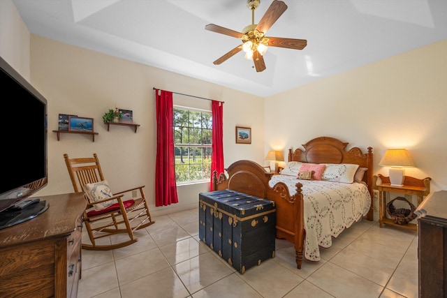 2891 SE Tailwinds Rd, Jupiter, FL 33478 - bedroom featuring light tile patterned flooring and a ceiling fan