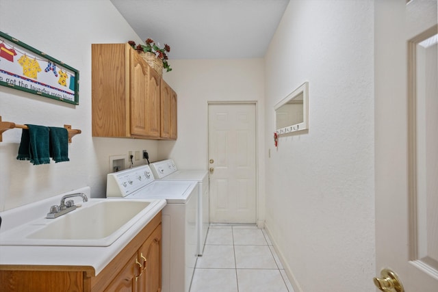 2891 SE Tailwinds Rd, Jupiter, FL 33478 - washroom with washing machine and dryer, cabinet space, and light tile patterned floors