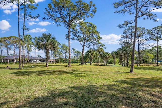 2891 SE Tailwinds Rd, Jupiter, FL 33478 - view of property's community with a yard