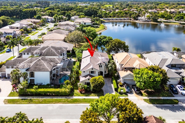 aerial view featuring a water view and a residential view