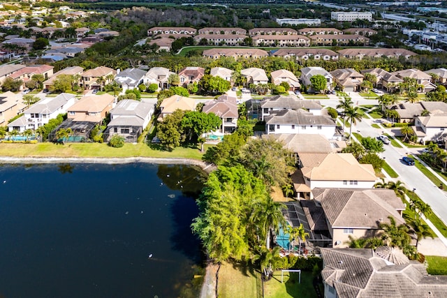 aerial view with a residential view and a water view