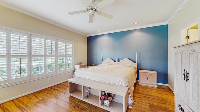 bedroom with ornamental molding, recessed lighting, baseboards, and wood finished floors