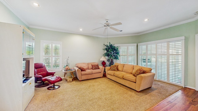 living area with ornamental molding, recessed lighting, and wood finished floors