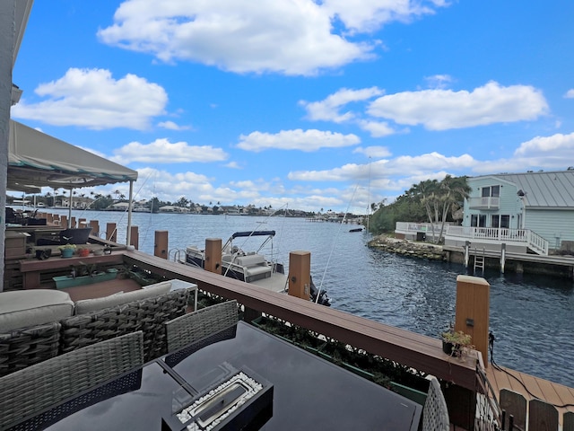 dock area with a water view