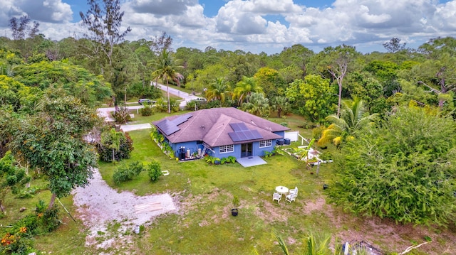 drone / aerial view with a forest view