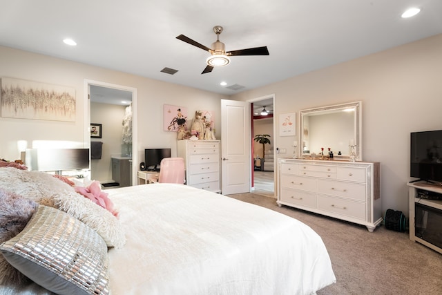 carpeted bedroom featuring visible vents, a ceiling fan, and recessed lighting