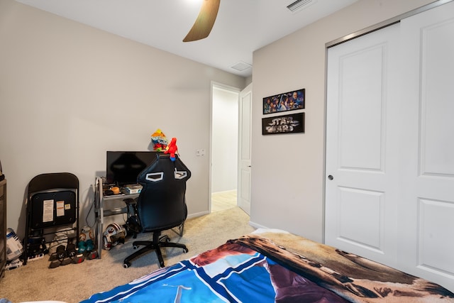 bedroom featuring ceiling fan, carpet floors, visible vents, and baseboards