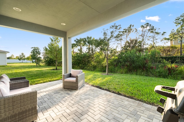 view of patio / terrace featuring a grill and an outdoor living space