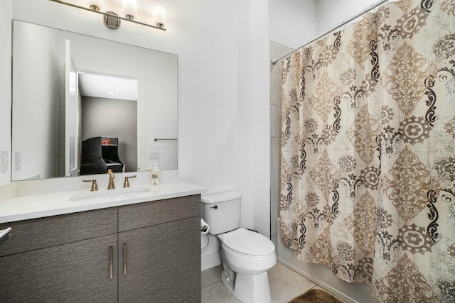 full bathroom featuring toilet, ensuite bathroom, shower / bath combo, vanity, and tile patterned flooring