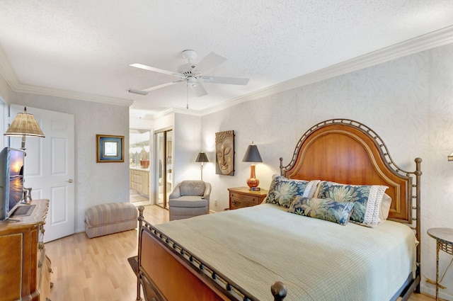 bedroom with light wood finished floors, a textured ceiling, crown molding, and wallpapered walls