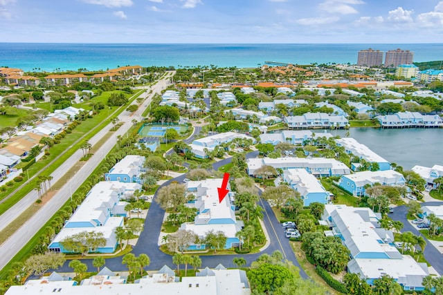 aerial view featuring a water view and a residential view