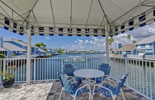 view of patio featuring a water view