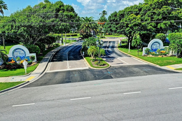 view of street with curbs