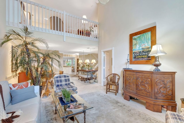 living room featuring a high ceiling