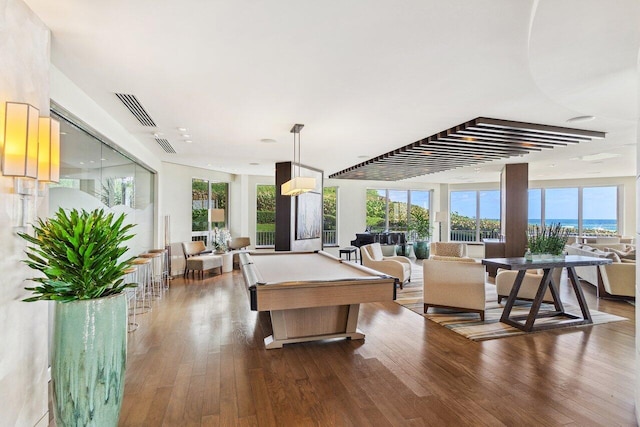 game room featuring plenty of natural light, visible vents, wood finished floors, and pool table