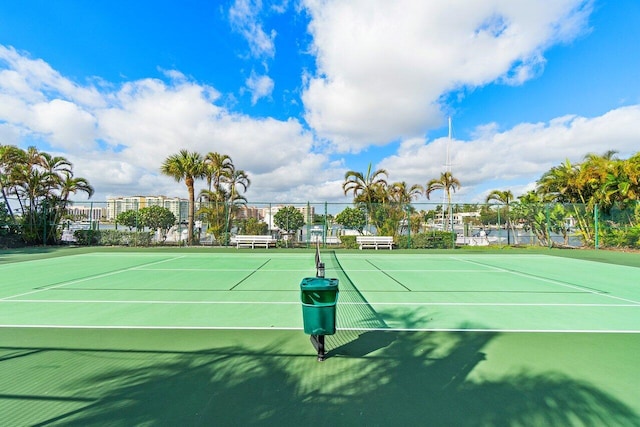 view of sport court with fence