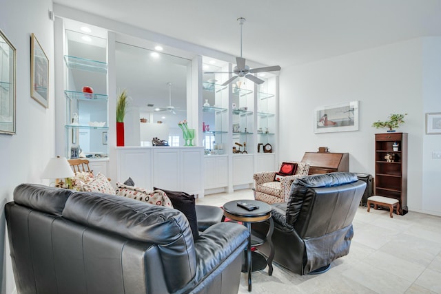 living area featuring ceiling fan