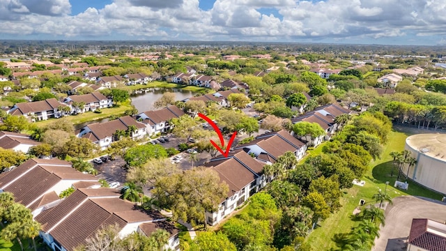 birds eye view of property with a residential view