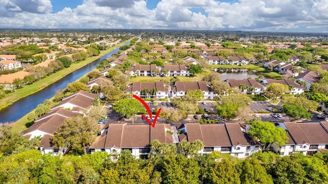 aerial view featuring a water view and a residential view