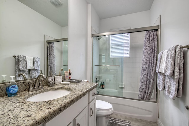 full bathroom featuring visible vents, toilet, shower / bath combination with glass door, wood finished floors, and vanity