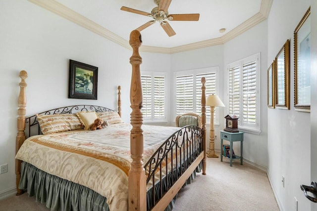 bedroom with a ceiling fan, carpet, baseboards, and crown molding