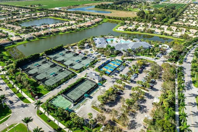 birds eye view of property featuring a water view