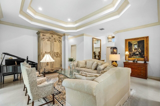 interior space featuring ornamental molding, a tray ceiling, visible vents, and light tile patterned floors