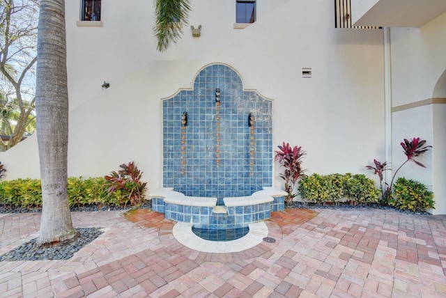 doorway to property with stucco siding