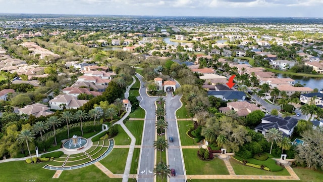 aerial view featuring a water view and a residential view