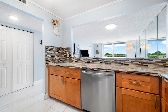 kitchen with stone counters, decorative backsplash, brown cabinetry, a textured ceiling, and dishwasher