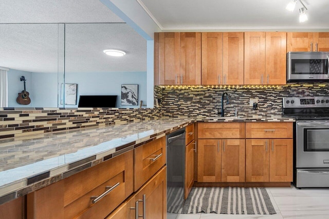 kitchen with brown cabinets, tasteful backsplash, and stainless steel appliances