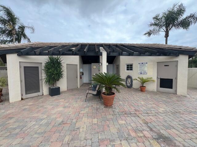 view of patio / terrace featuring fence