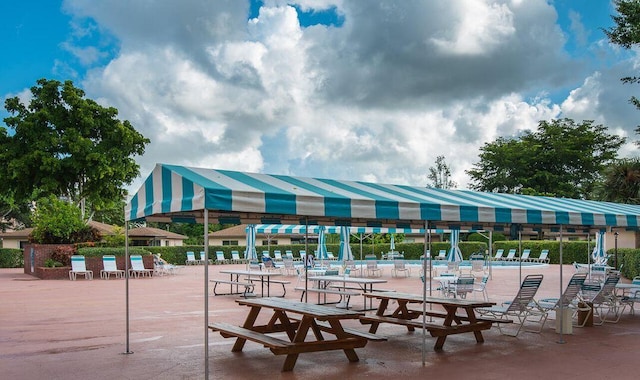 view of home's community featuring a patio area