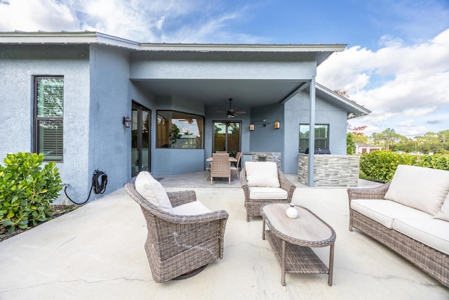 view of patio / terrace with ceiling fan and an outdoor hangout area