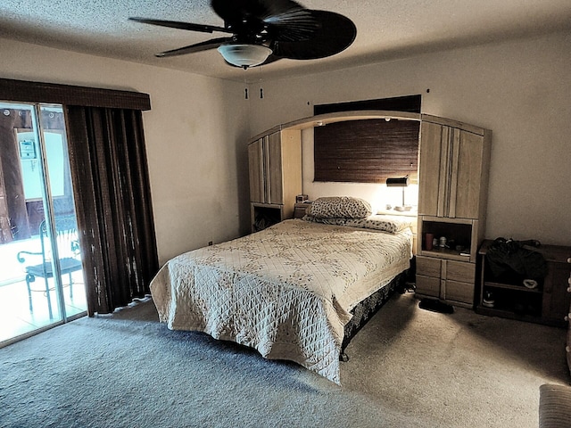 bedroom with ceiling fan, carpet, access to outside, and a textured ceiling