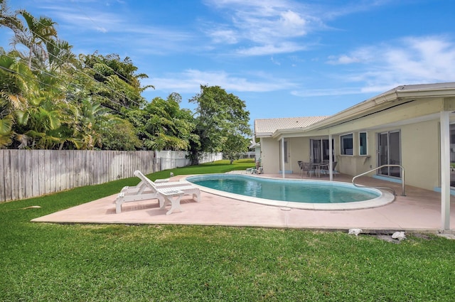 view of pool featuring a fenced in pool, a yard, a patio, and fence