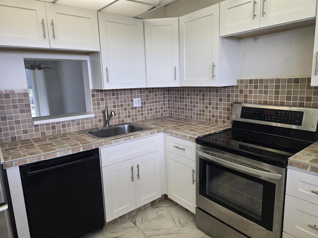 kitchen featuring electric range, a sink, white cabinets, marble finish floor, and dishwasher