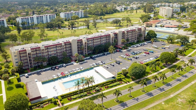 aerial view featuring a water view and a city view